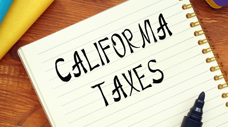 California Taxes written on a notepad