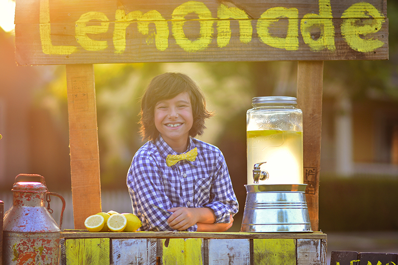 boy selling lemonade