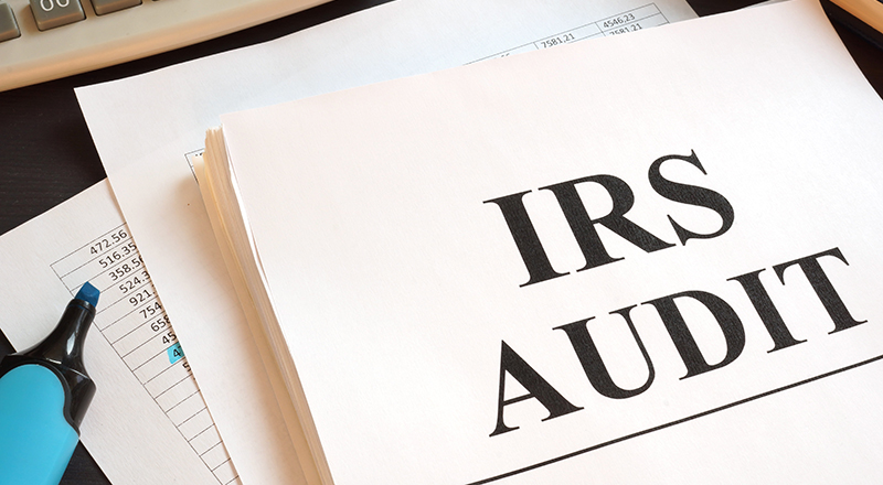 IRS Audit Written on a Paper