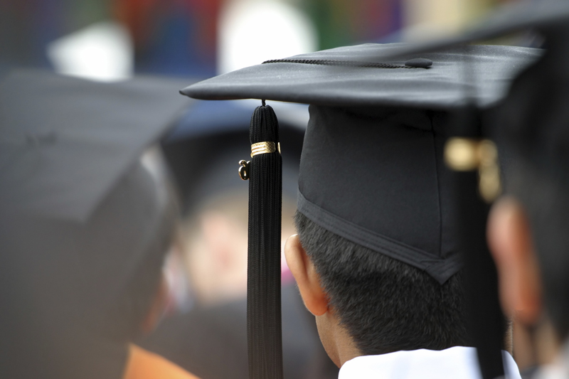 Students wearing graduation hats