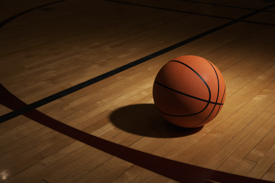 Basketball resting on a Basketball Court