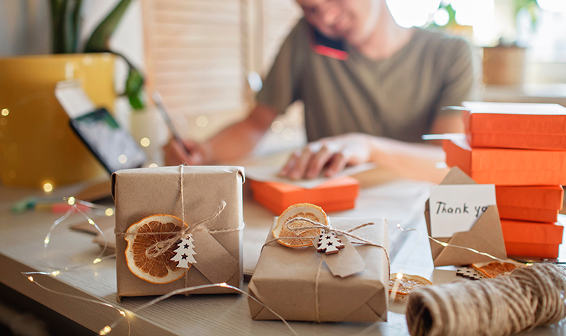 Man preparing gifts for clients