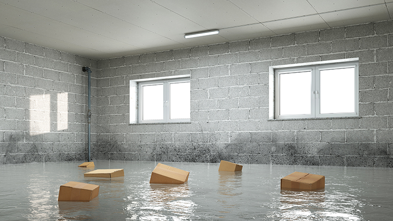 Flooded basement with boxes floating
