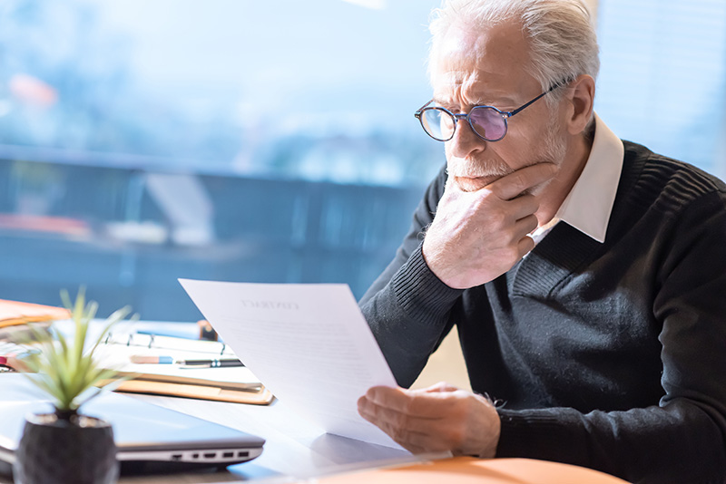 Man reading a letter