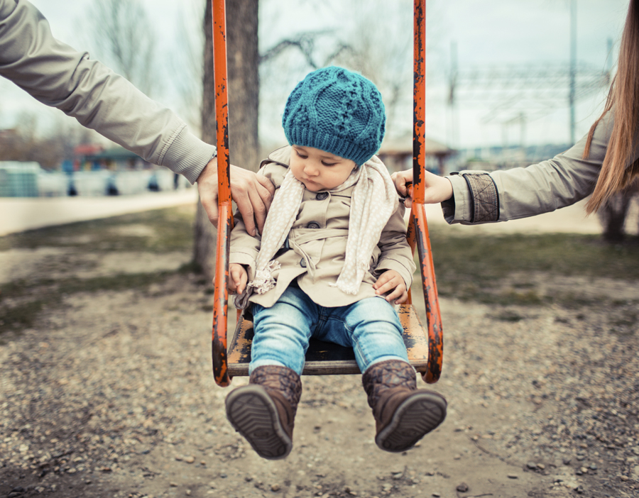 small child on swing