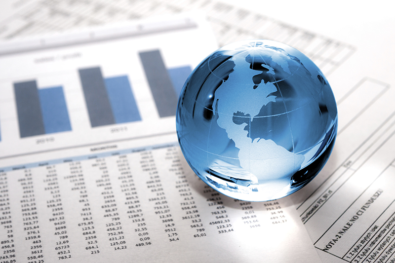 Glass globe on financial statements