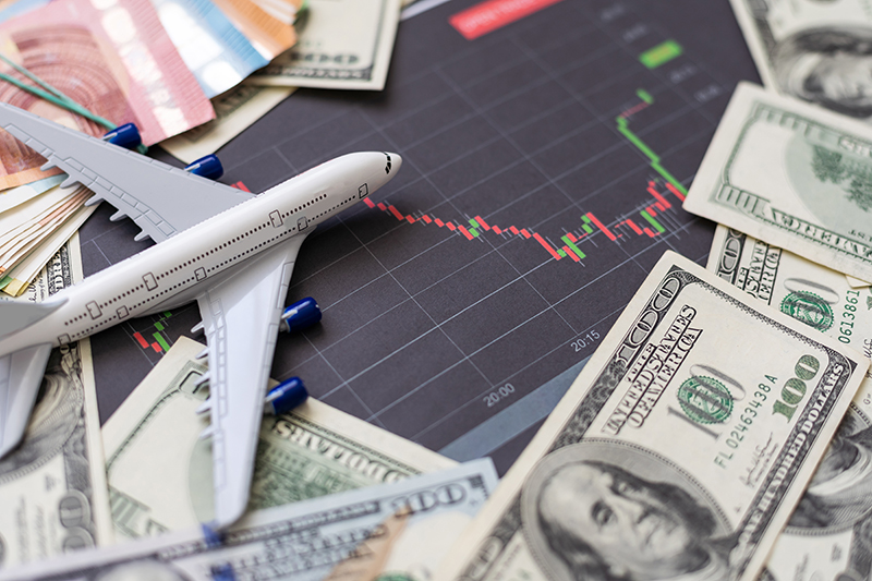 Airplane on money background