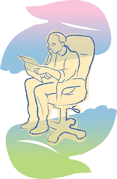 Man sitting in a chair and reading an audit letter