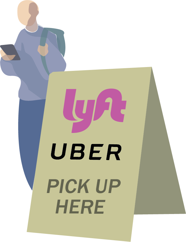 man standing by rideshare pickup sign