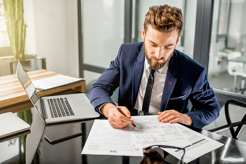 Tax Professional looking over tax documents