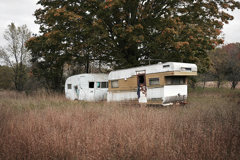 Old trailer on vacant land