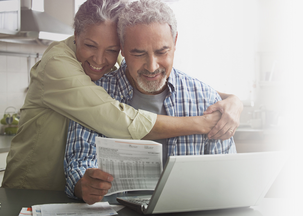 happy couple reading letter