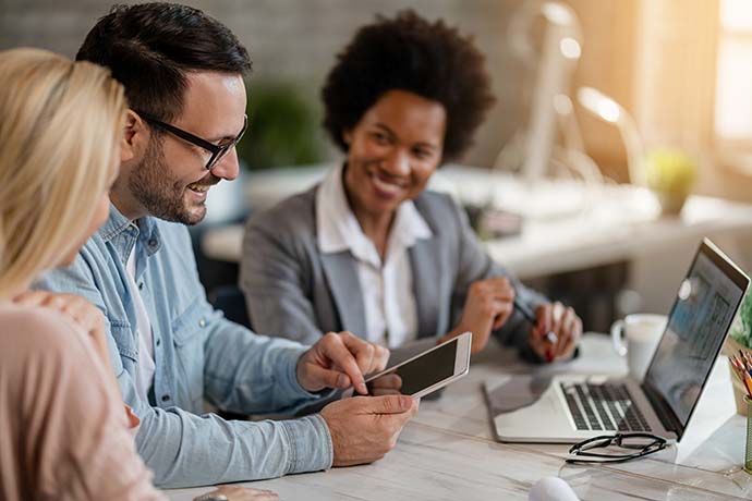 Smiling business owner getting tax debt relief