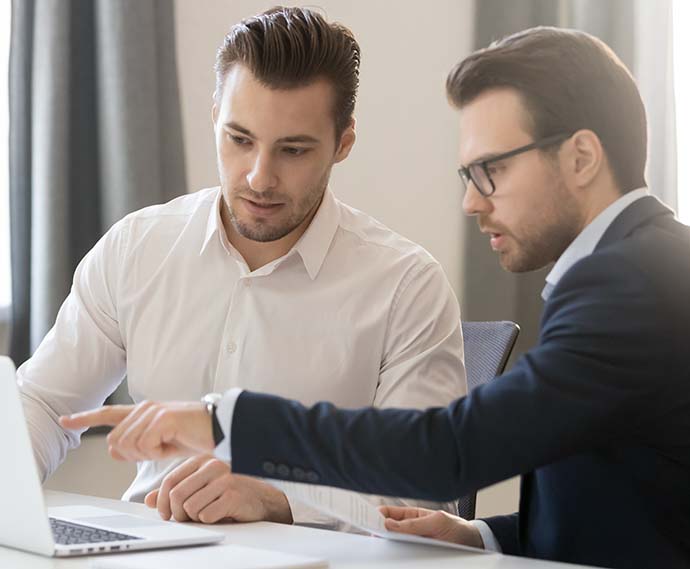 Two men discussing options to stop an IRS Levy