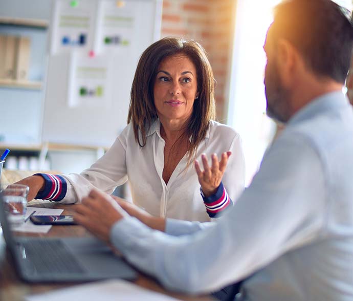 Woman inquiring about tax debt forgiveness