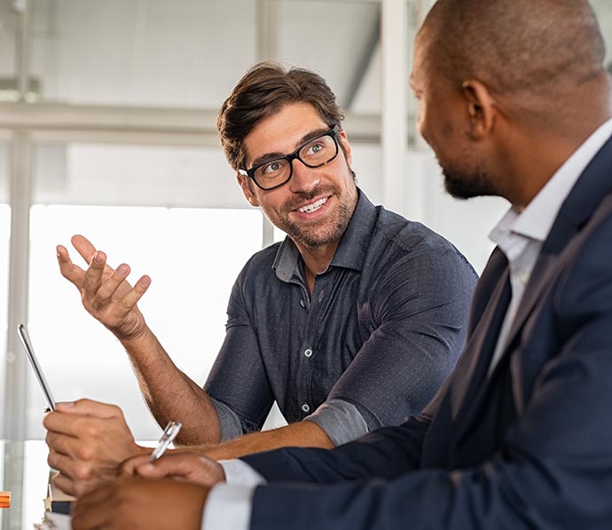 Men discussing state tax debt relief