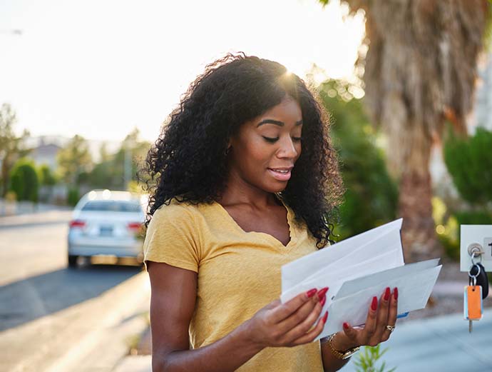 woman reading  letter