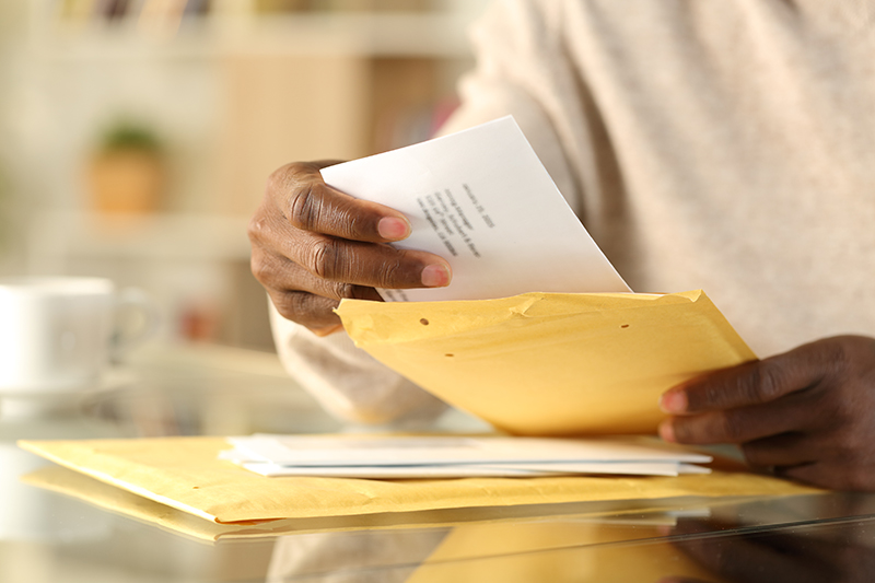 Person opening letter