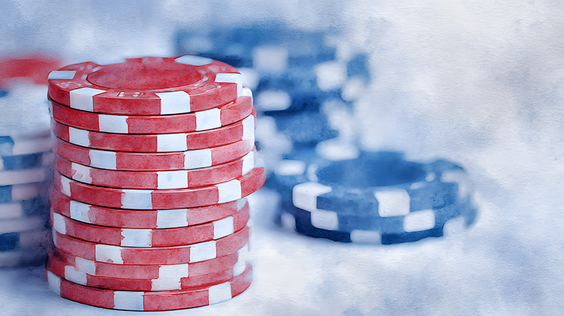 Gambling Chips on a cold feeling background