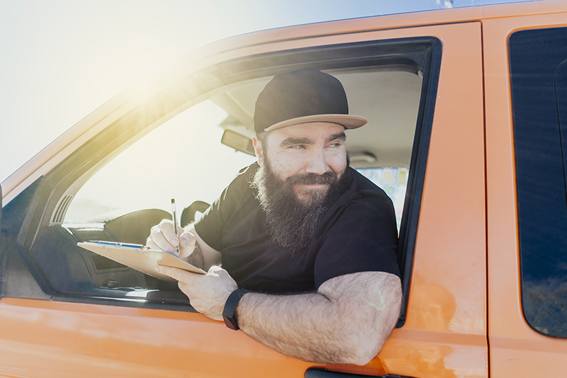 Man driving for work