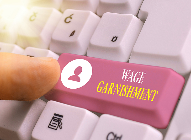 Wage Garnishment Button on a Keyboard