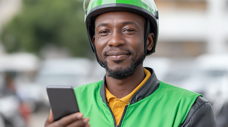 Gig working holding up cellphone