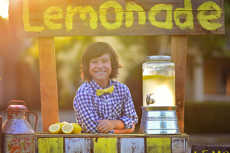 Boy selling Lemonade