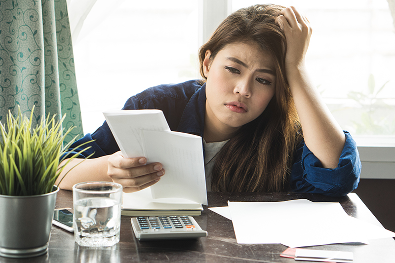 woman distressed about tax bill