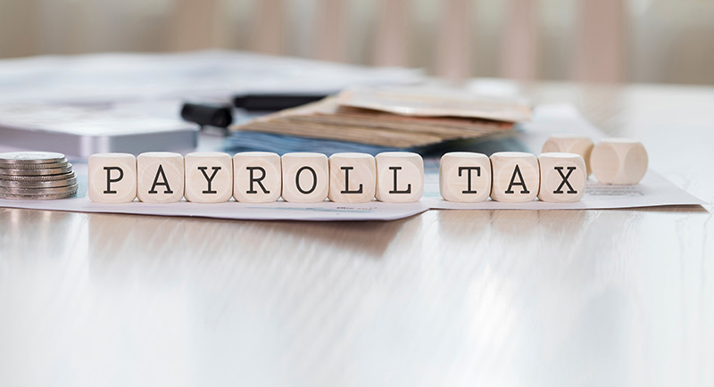 Payroll Tax written in blocks
