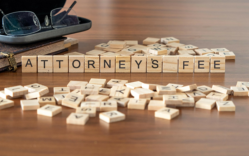 attorney’s fees written with tiles