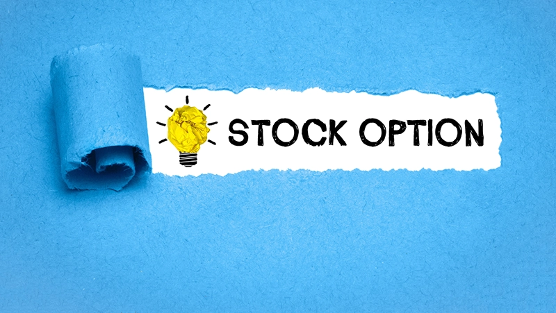 Light Bulb and Stock Option written on torn paper