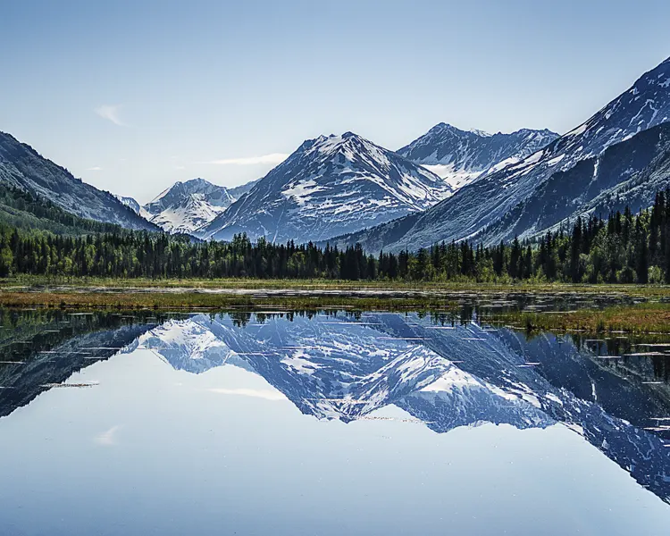 Lake at the base of mountains