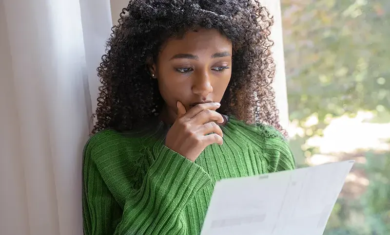 Woman reading a letter